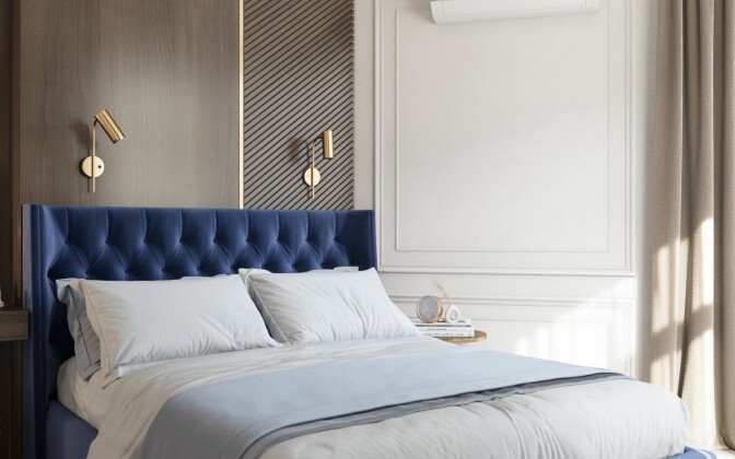 Синяя кровать в спальне стиля неоклассика